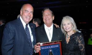Arthur M. Kassel, Pres/CEO of Eagle & Badge Foundation; Donald T. Sterling, Chairman - E&B Board of Governors, and Shelly Sterling.